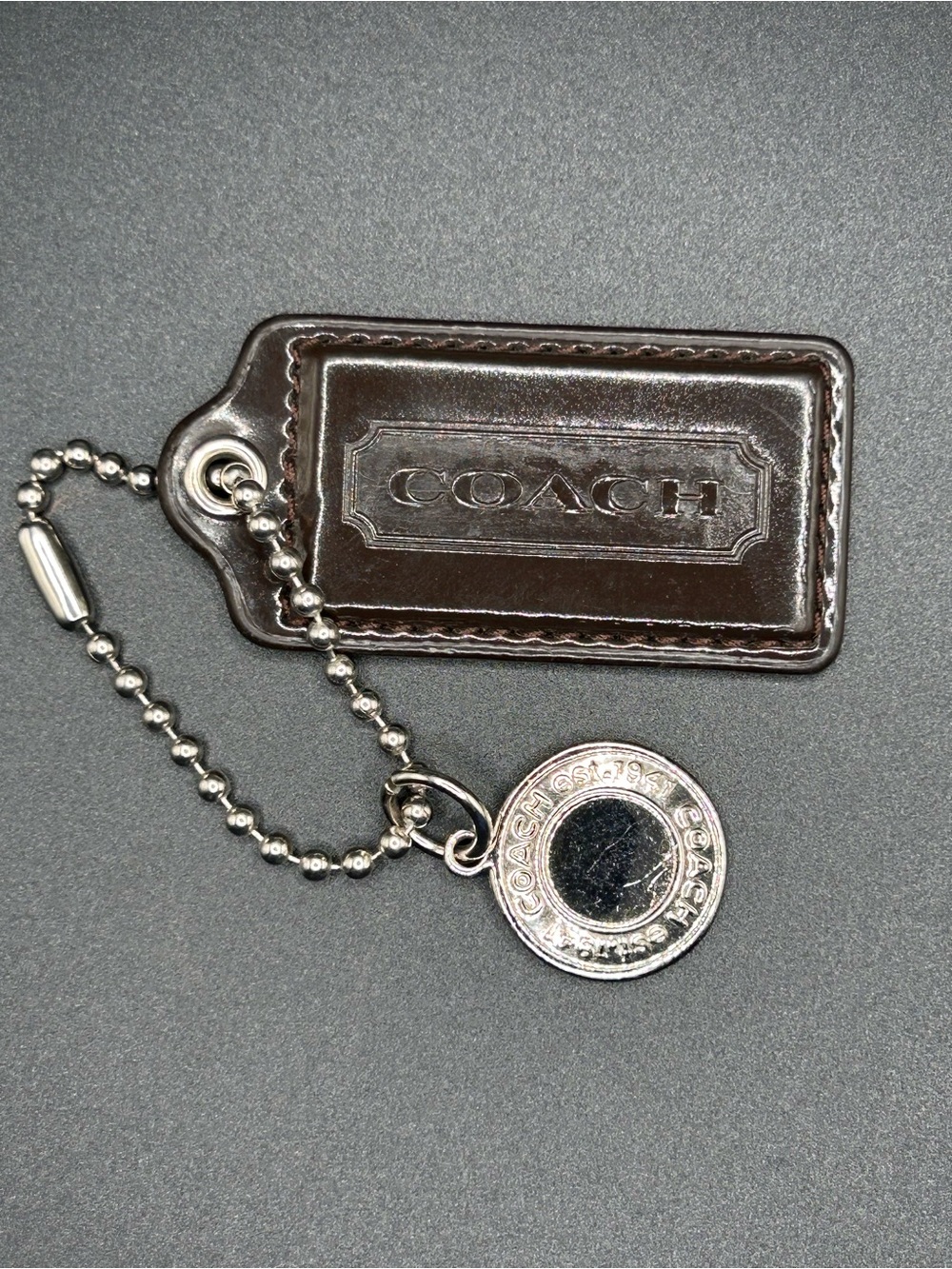 Coach Dark Brown Leather Key Tag with Silver-Tone Chain and Charm